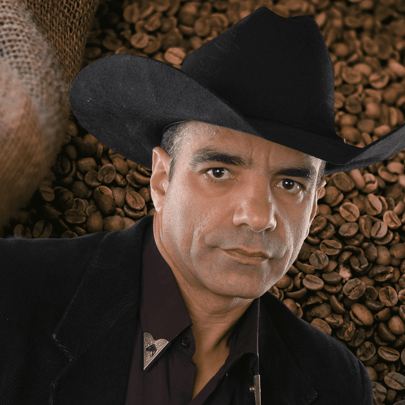 Man in cowboy hat with coffee beans background.