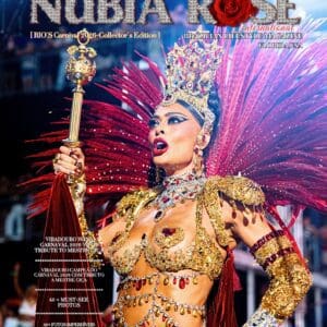 Carnival dancer in ornate red feather costume